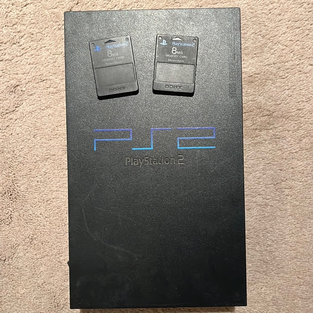 Play station 2 with 2 memory cards call of duty head set